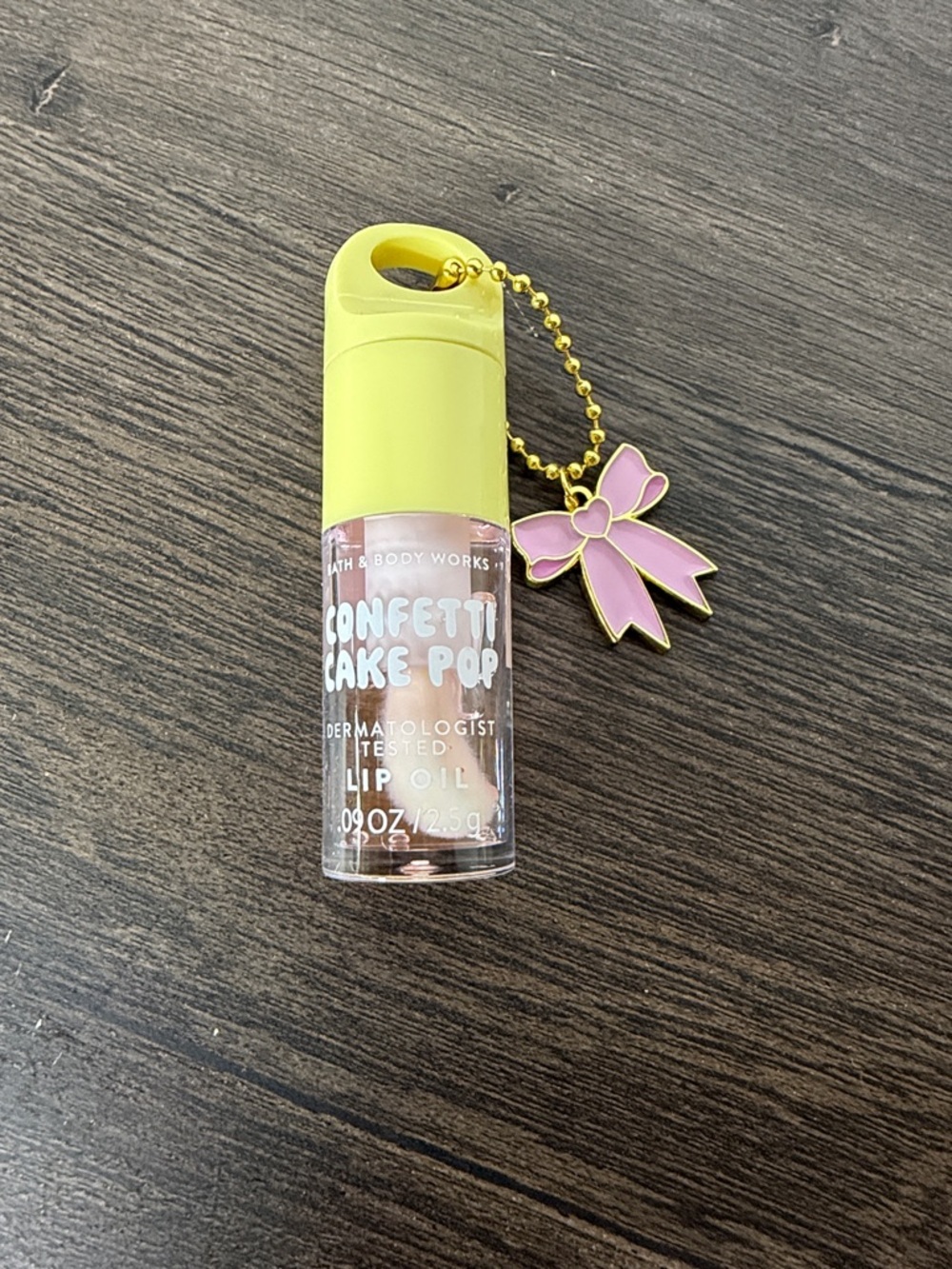 Bath & Body Works Confetti Cake Pop Lip Oil with Pink Bow Charm